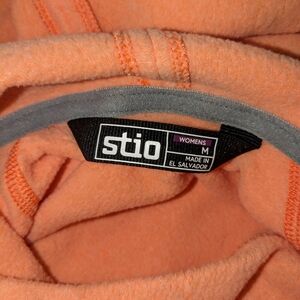 Stio mango-colored hoodie